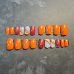 Press on nails orange décoré