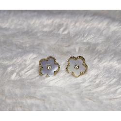 Boucle d'oreille fleur doré acier inoxydable